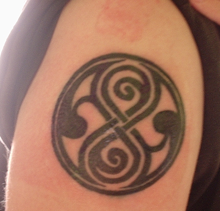 Seal of approval: Heidi accessorises the swirly tattoo with her similarly